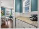 Additional kitchenette space with custom cabinetry and granite countertop at 121 Warbler Way, Summerville, SC 29483