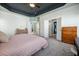 View of a large main bedroom looking towards the ensuite bathroom and includes carpeted floors at 121 Warbler Way, Summerville, SC 29483