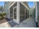 Enclosed back porch, with view of the yard at 121 Warbler Way, Summerville, SC 29483