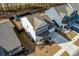 Aerial shot of a two-story home with a lush backyard and an attached two car garage at 127 Surfbird Rd, Summerville, SC 29486