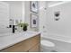 Modern bathroom features stylish fixtures and a bathtub with white subway tile surround at 1308 Lieben Rd, Mount Pleasant, SC 29466