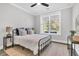Cozy bedroom with a ceiling fan, natural light, and a calming neutral palette at 1308 Lieben Rd, Mount Pleasant, SC 29466