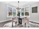 Sun-filled dining room with modern chandelier and natural light at 1308 Lieben Rd, Mount Pleasant, SC 29466