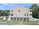 Side view of home featuring a screened in back porch and a well-manicured lawn at 1308 Lieben Rd, Mount Pleasant, SC 29466
