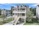 Beautiful raised home with double decks, inviting stairway, and well-kept yard at 1308 Lieben Rd, Mount Pleasant, SC 29466