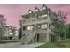 Stunning two-story coastal home with double balconies and a spacious driveway at 1308 Lieben Rd, Mount Pleasant, SC 29466