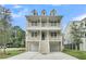 Stunning home featuring an elevated design with inviting double porches and a spacious two-car garage at 1308 Lieben Rd, Mount Pleasant, SC 29466