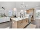 Open kitchen view with island, modern fixtures, and stainless steel appliances at 1308 Lieben Rd, Mount Pleasant, SC 29466