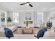Spacious Living Room with lots of seating, natural light, and modern decor at 1308 Lieben Rd, Mount Pleasant, SC 29466