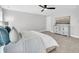 Cozy main bedroom showcasing a ceiling fan, comfortable bed, and a stylish dresser at 1308 Lieben Rd, Mount Pleasant, SC 29466