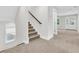 Carpeted stairway leading to the second floor of the home at 1308 Lieben Rd, Mount Pleasant, SC 29466