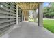 View of the area under the porch featuring concrete pillars and horizontal slats at 1308 Lieben Rd, Mount Pleasant, SC 29466