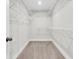Walk-in closet with multiple racks and carpeted flooring at 1308 Lieben Rd, Mount Pleasant, SC 29466