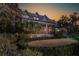 Expansive screened porch and balcony area in a professionally landscaped private yard at 15 Watroo Pt, Daniel Island, SC 29492