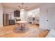 Open living area features dining space, a kitchenette, and bunkbeds at 15 Watroo Pt, Daniel Island, SC 29492