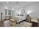 Bright bedroom with large window, desk area, and light-colored decor at 150 Royal Assembly Dr, Charleston, SC 29492