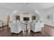 Bright living room with hardwood floors, modern furniture, and pitched ceilings with recessed lighting at 150 Royal Assembly Dr, Charleston, SC 29492