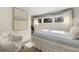 Comfortable bedroom featuring soft blue accents and a cozy white chair at 161 Marsh Hawk Ln, Kiawah Island, SC 29455