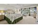 Comfortable bedroom with a large window, scenic views, and plush decor at 161 Marsh Hawk Ln, Kiawah Island, SC 29455