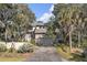 Well-maintained home with lush landscaping, an attached two-car garage, and a serene setting at 161 Marsh Hawk Ln, Kiawah Island, SC 29455
