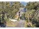 Charming home featuring lush landscaping, a private driveway, and a serene waterfront view at 161 Marsh Hawk Ln, Kiawah Island, SC 29455
