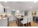 Kitchen featuring white cabinets, granite countertops, and stainless steel appliances at 161 Marsh Hawk Ln, Kiawah Island, SC 29455