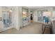 Welcoming living room featuring neutral colors and plenty of natural light from the sliding doors at 161 Marsh Hawk Ln, Kiawah Island, SC 29455