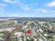 Overhead view of neighborhood featuring lush landscape, golf course, and stunning coastal scenery at 164 River Green Pl, Charleston, SC 29492