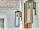 Stylish exterior lighting fixtures that complement the home's architecture and enhance its curb appeal at 164 River Green Pl, Charleston, SC 29492
