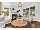Inviting living room featuring a cozy fireplace, comfortable seating, and stylish accents at 164 River Green Pl, Charleston, SC 29492