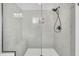 A marble shower is enclosed in glass and has a bench at 164 River Green Pl, Charleston, SC 29492