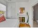 Bedroom with a fireplace, built-in wardrobe, and an ensuite bathroom at 179 Wentworth St, Charleston, SC 29401