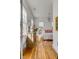 Bedroom featuring a hardwood dresser with a lit window and a view of the bed at 179 Wentworth St, Charleston, SC 29401