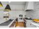 Well-appointed kitchen with premium appliances, white cabinetry, and a stylish design at 179 Wentworth St, Charleston, SC 29401