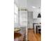 Bright kitchen with a white ladder, gold accents, and an open layout at 179 Wentworth St, Charleston, SC 29401