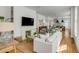 Bright and spacious living room with hardwood floors, fireplace, and comfortable white seating at 179 Wentworth St, Charleston, SC 29401