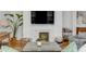 Cozy living room featuring a fireplace, stylish decor, and comfortable seating for relaxation and entertainment at 179 Wentworth St, Charleston, SC 29401