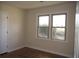 Bright bedroom with two windows and sleek wood-look flooring at 1927 Hazelwood Dr, Charleston, SC 29407