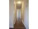Hallway boasting gleaming wood floors and fresh paint at 1927 Hazelwood Dr, Charleston, SC 29407