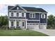 Charming two-story blue home with white trim, a well-manicured lawn, and a three-car garage at 2006 Riverbend Dr, Charleston, SC 29412