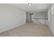 Bright hallway featuring neutral walls and carpet, offering access to different areas of the home at 2006 Riverbend Dr, Charleston, SC 29412