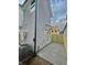 Back exterior of home featuring patio, privacy fence, and modern siding at 2035 Beech Ave, North Charleston, SC 29405
