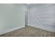 Bedroom featuring decorative trim work, light walls, and wood-look flooring at 2035 Beech Ave, North Charleston, SC 29405