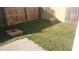 A backyard featuring a wooden fence and some grass at 204 Tyner Trl, Summerville, SC 29486