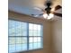 Bright bedroom featuring a ceiling fan and a large window with blinds at 204 Tyner Trl, Summerville, SC 29486