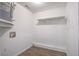 Practical laundry room with shelving for storage and easy access to utilities at 205 Weber Rd # B, Summerville, SC 29483