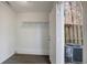 Functional laundry room with direct outdoor access and additional storage shelving at 205 Weber Rd # B, Summerville, SC 29483