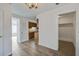 Open living space with modern flooring, seamlessly connecting to the laundry and kitchen areas at 205 Weber Rd # B, Summerville, SC 29483