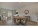 Inviting living space with a dining area, comfortable seating, and lots of natural light at 206 Pine Crest View Dr, Summerville, SC 29486