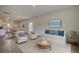 Spacious living room with large windows, a comfortable seating area, and an open floor plan at 206 Pine Crest View Dr, Summerville, SC 29486